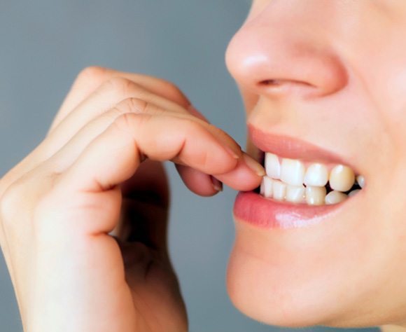 Person biting their nails
