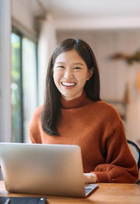 Patient in Englewood Cliffs smiling after cosmetic dentistry