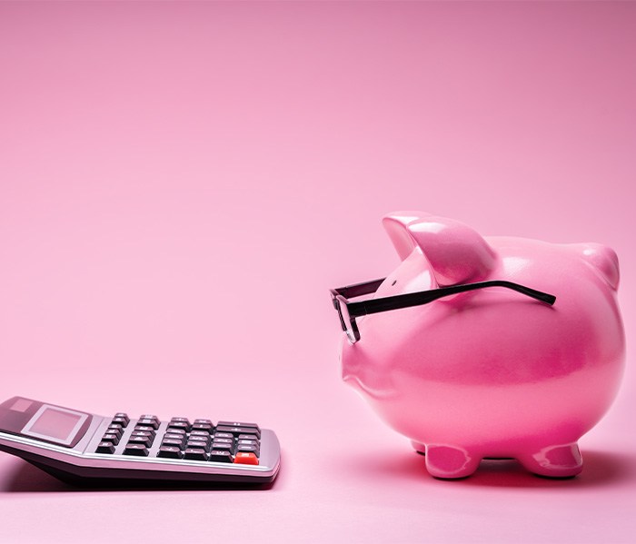 Piggy bank and a calculator