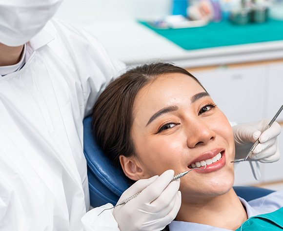 Woman smiling at the dentist